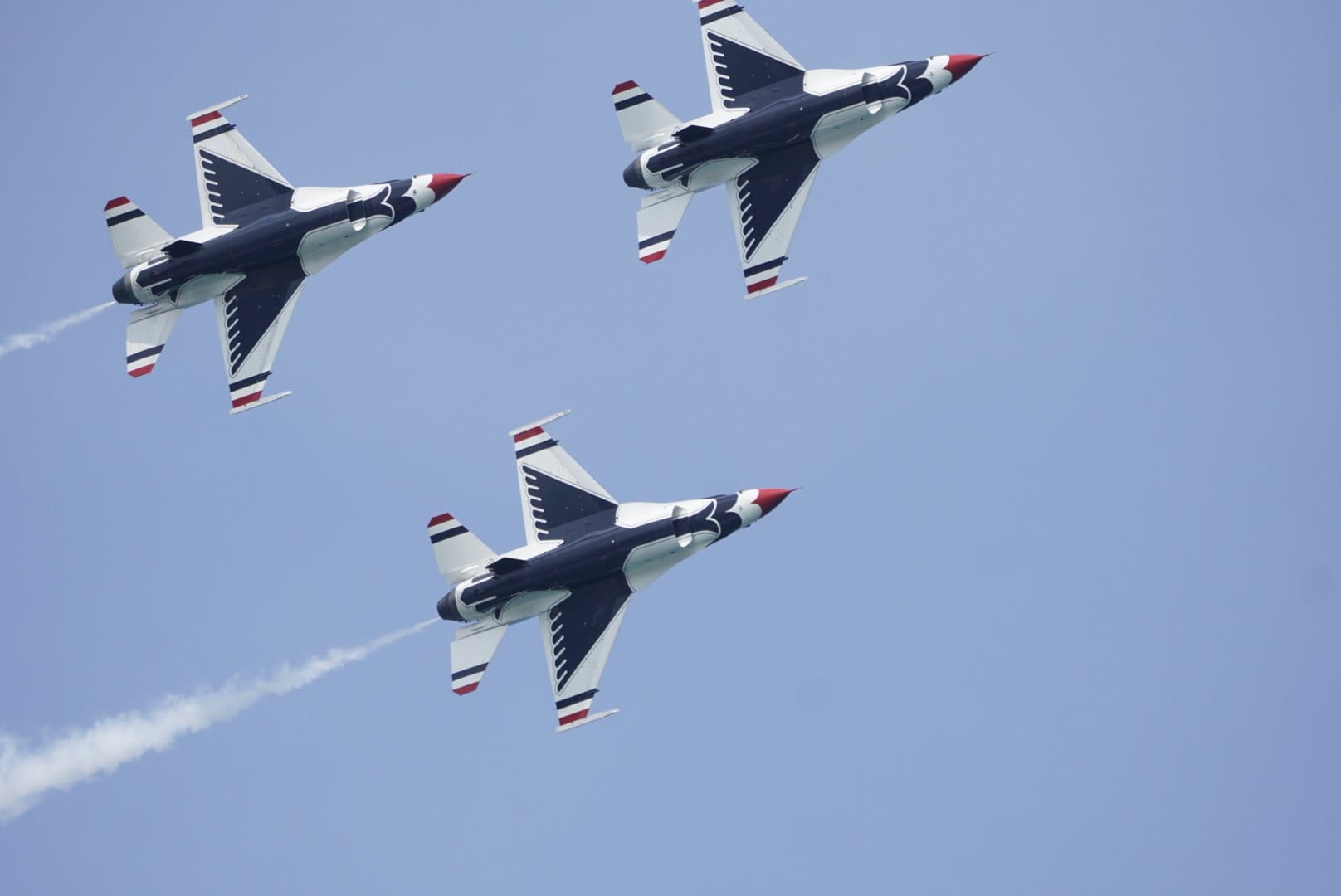Three jets bank together in a broad formation. — by Ed Shpritz