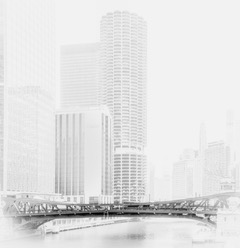 Marina City towers and a bridge dissolving into a bright white morning over the Chicago River