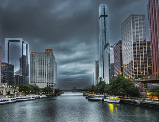 Low clouds over the Chicago River and skyline